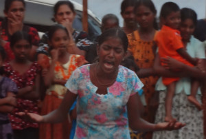 Young actress performing during the street drama.